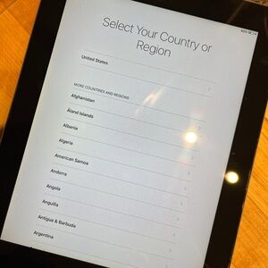 iPad 2 w/headphones & cable